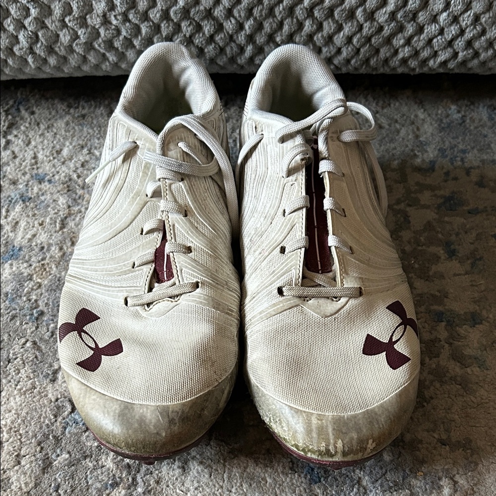 Under Armour Cream and Maroon Cleats